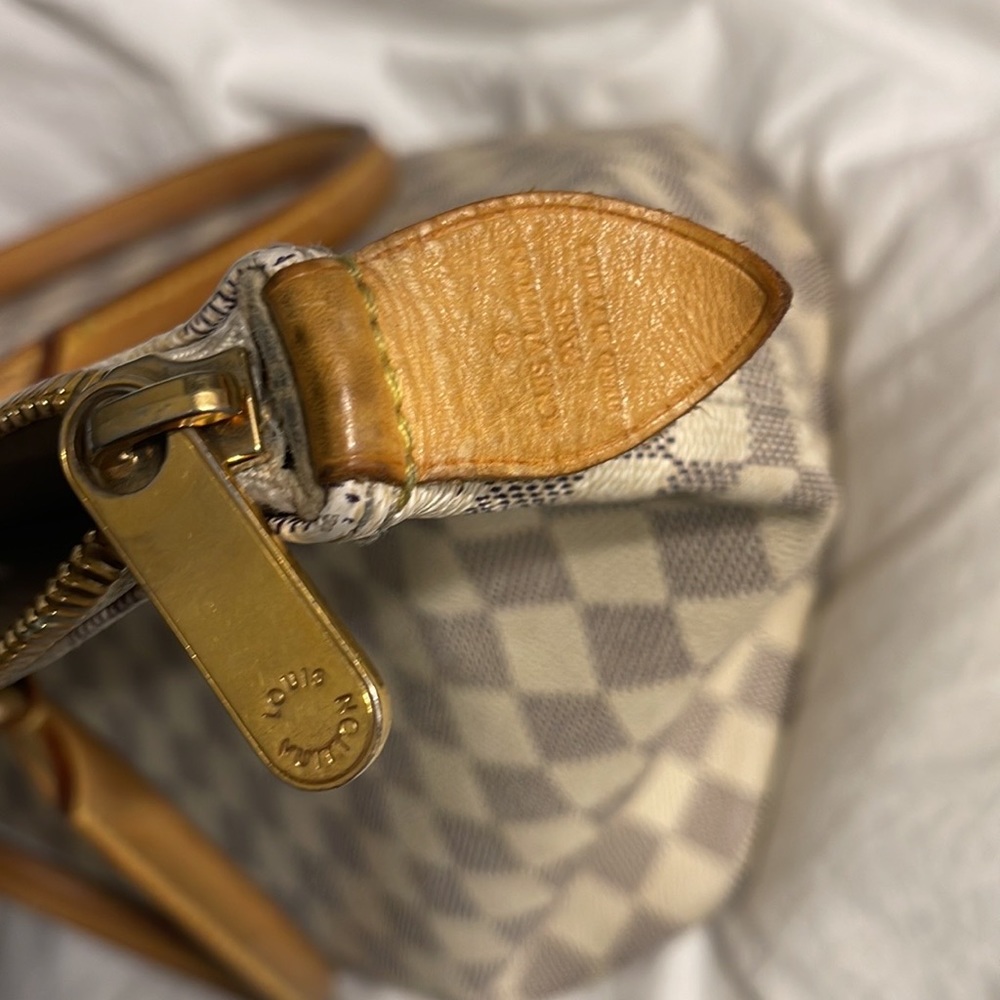 Selling my very well loved authentic louis bag.